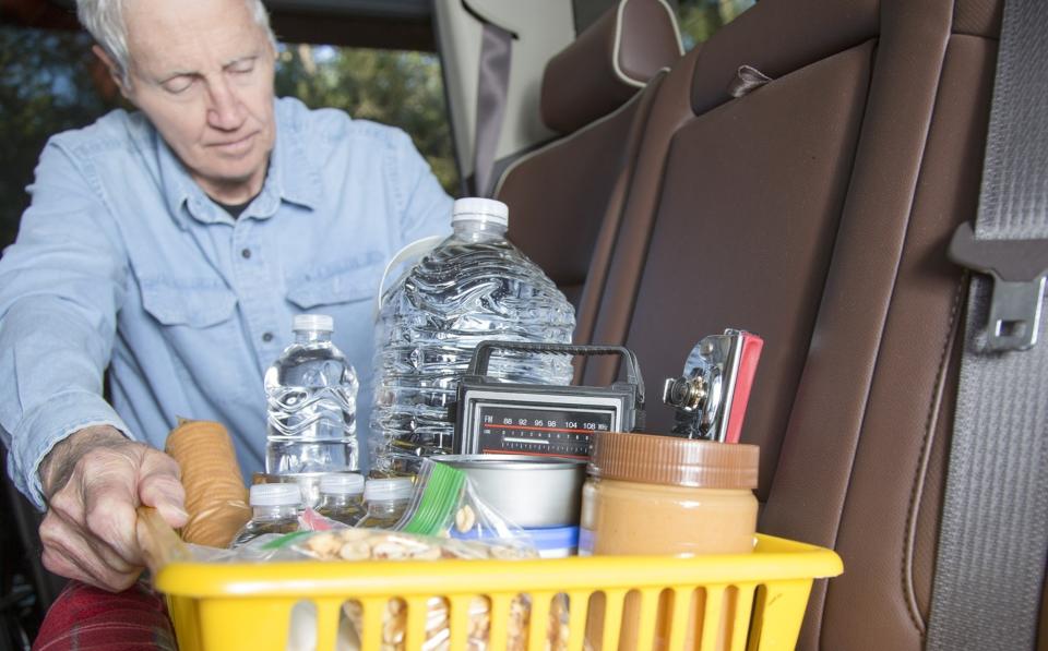Man with emergency kit